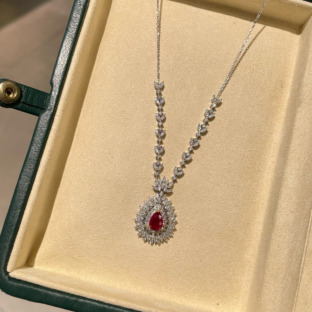 14k Gold 1.15 Ct Natural Ruby & Diamond Necklace: Ref:231072145 // gold content:14k gold // main gemstone:ruby // shape:pear // carat weight:1. 15ct // color:pigeonblood red // treatment:natural // // adjacent gemstone 2 : diamond // shape:multiple /
