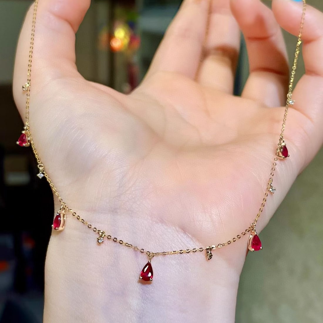 14k Gold 1.21 Ctw Natural Ruby & Diamond Necklace: Ref:231072197 // gold content:14k gold // main gemstone:ruby // shape:pear // carat weight:1. 15ct // color:red // treatment:natural // // adjacent gemstone 2 : diamond // shape:round // carat weight: