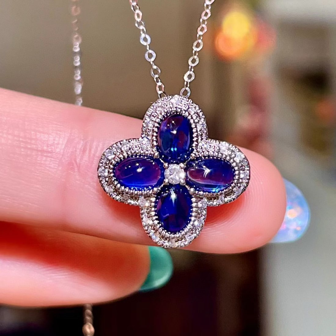 14k Gold 2.16 Ctw Natural Sapphire & Diamond Pendant( Without Chain ): Ref:231072199 // gold content:14k gold // main gemstone:sapphire // shape:oval // carat weight:2. 01ct // color:blue // treatment:natural // // adjacent gemstone 2 : diamond // shape:round // carat