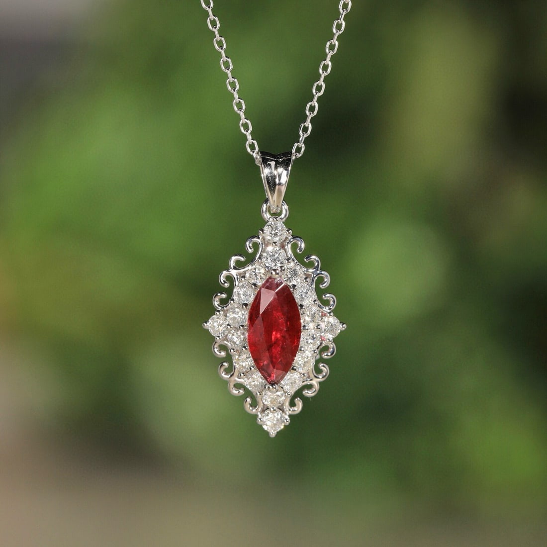 14k Gold 1.50 Ctw Natural Ruby & Diamond Necklace: Ref:231072238 // gold content:14k gold // main gemstone:ruby // shape:marquise // carat weight:0. 87ct // color:red // treatment:natural // // adjacent gemstone 2 : diamond // shape:round // carat wei