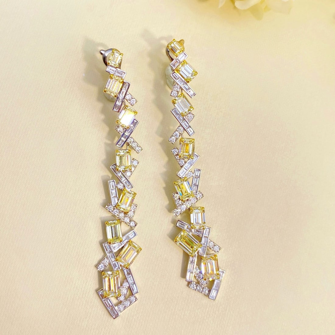 14k Gold 9.04 Ctw Natural Yellow Diamond & Diamond Earrings: Ref:231072241 // gold content:14k gold // main gemstone:yellow diamond // shape:emerald // carat weight:7. 22ct // color:yellow // treatment:natural // // adjacent gemstone 2 : diamond // shape:multip