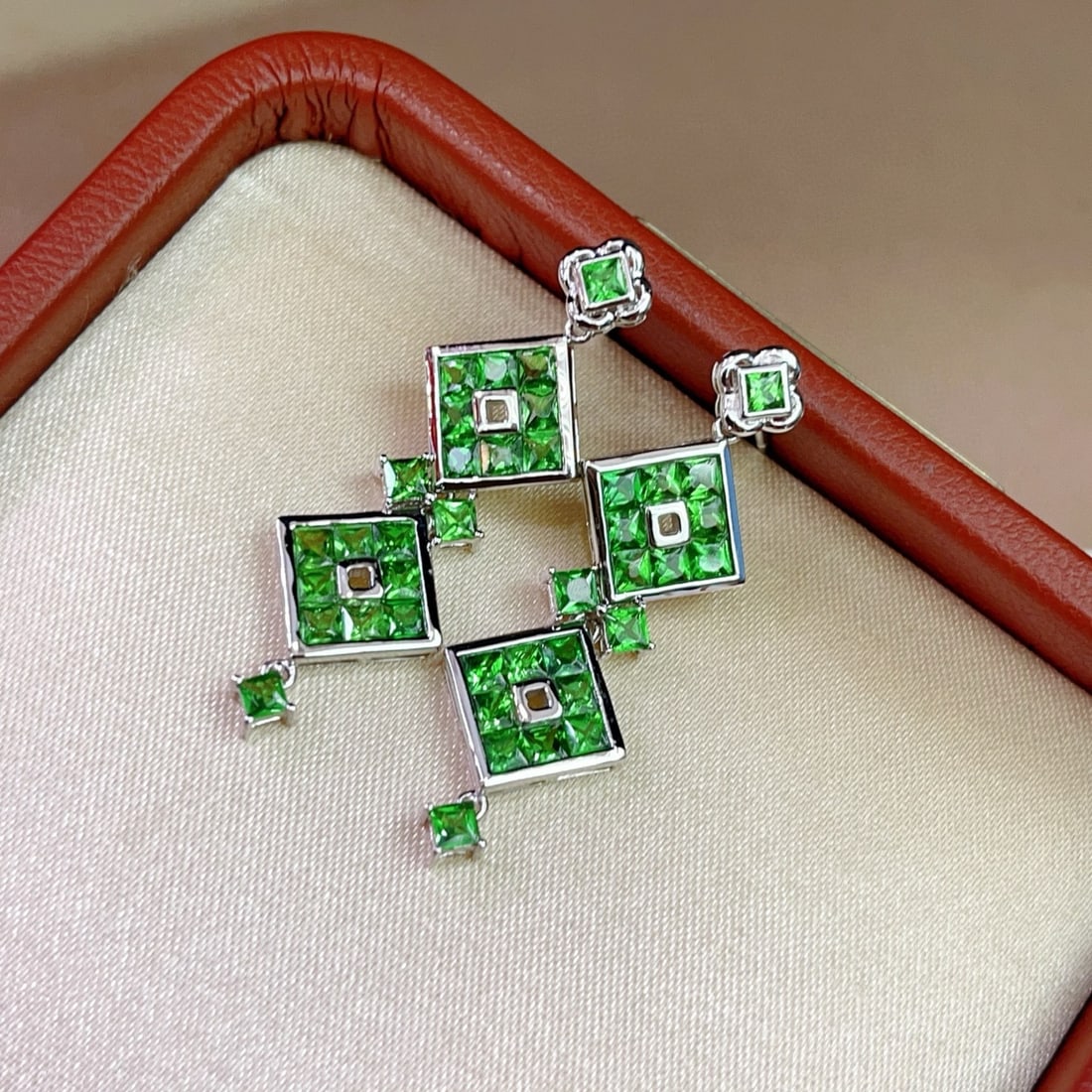 14k Gold 4.50 Ct Natural Tsavorite Earrings: Ref:231072259 // gold content:14k gold // main gemstone:tsavorite // shape:princess // carat weight:4. 50ct // color:green // treatment:natural // Condition: New Low Estimate: 4600.00 High Estimate: