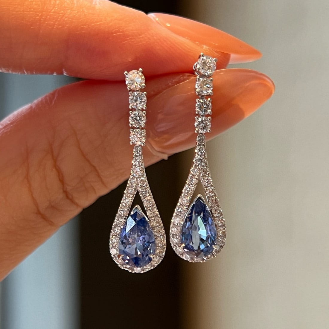 14k Gold 3.12 Ctw Natural Sapphire & Lab Grown Diamond Earrings: Ref:231072287 // gold content:14k gold // main gemstone:sapphire // shape:pear // carat weight:2. 22ct // color:blue // treatment:natural // // adjacent gemstone 2 : lab grown diamond // shape:round