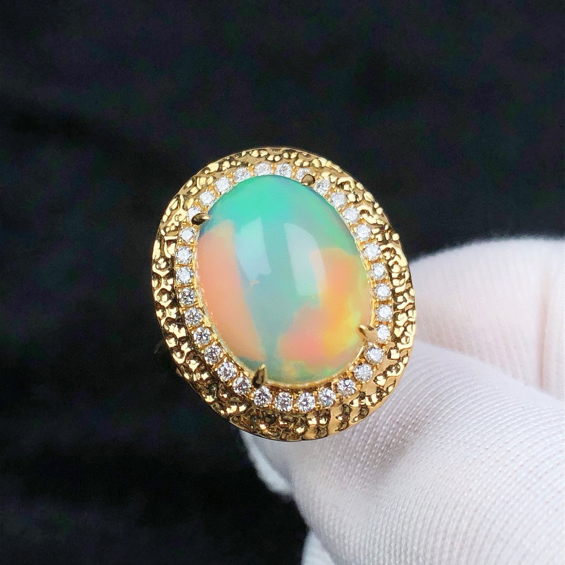 14k Gold 5.03 Ctw Natural Opal & Diamond Ring: Ref:231072338 // gold content:14k gold // ring size:7. 25us // // main gemstone:opal // shape:oval // carat weight:4. 78ct // color:color // treatment:natural // // adjacent gemstone 2 : diamond // sh