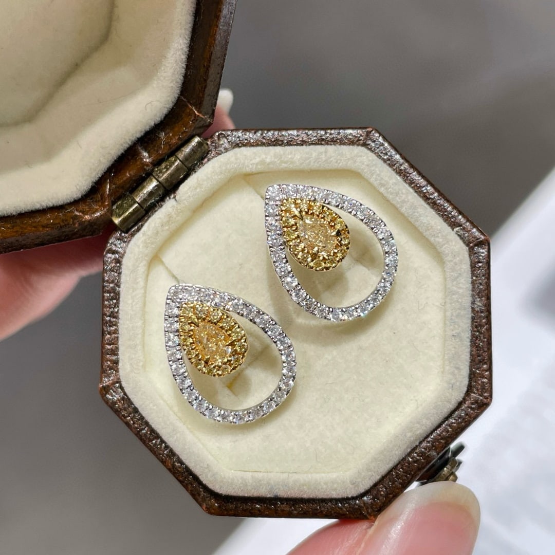 14k Gold 0.56 Ct Natural Color Diamond Earrings: Ref:231072342 // gold content:14k gold // main gemstone:diamond // shape:multiple // carat weight:0. 56ct // clarity grade:vs-si // color:color // treatment:natural // Condition: New Low Estimate: