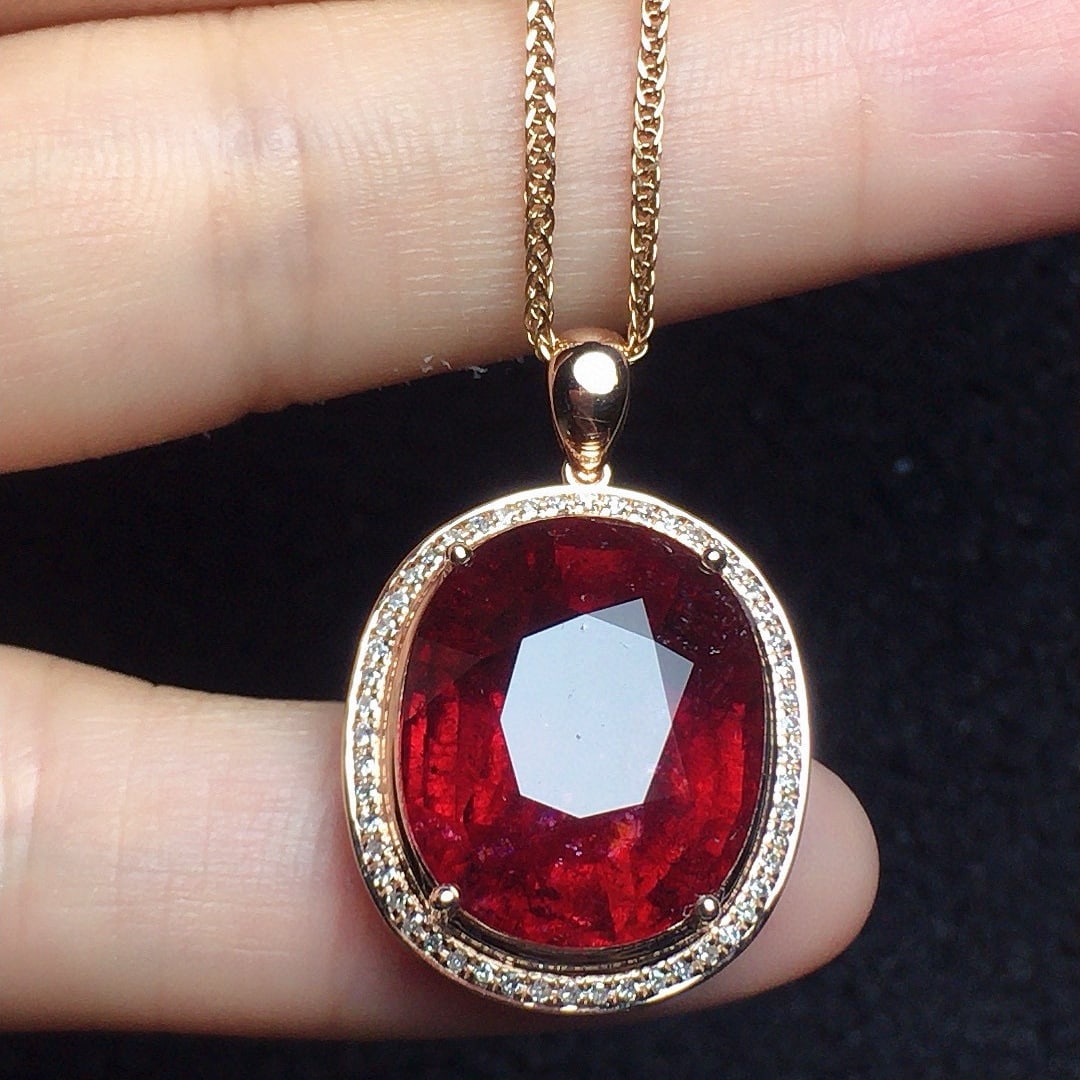 14k Gold 12.65 Ct Natural Tourmaline & Diamond Pendant( Without Chain ): Ref:231072384 // gold content:14k gold // main gemstone:tourmaline // shape:oval // carat weight:12. 65ct // color:red // treatment:natural // // adjacent gemstone 2 : diamond // number of stones:52