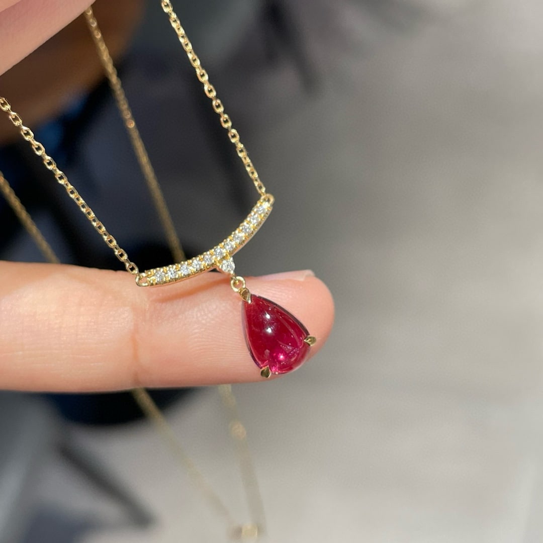 14k Gold 1.88 Ct Natural Tourmaline & Diamond Necklace: Ref:231072402 // gold content:14k gold // main gemstone:tourmaline // shape:pear // carat weight:1. 88ct // color:red // treatment:natural // // adjacent gemstone 2 : diamond // number of stones:22