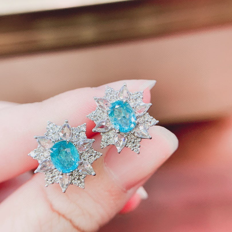14k Gold 2.0 Ctw Natural Paraiba Tourmaline & Diamond Earrings: Ref:231072403 // gold content:14k gold // main gemstone:paraiba tourmaline // shape:oval // carat weight:1. 2ct // color:blue // treatment:natural // // adjacent gemstone 2 : diamond //