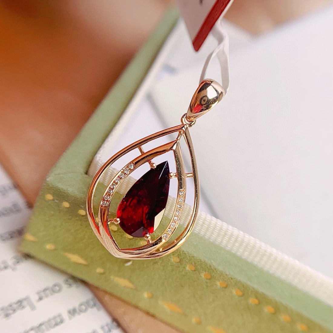 14k Gold 1.40 Ct Natural Tourmaline & Diamond Pendant( Without Chain ): Ref:231072444 // gold content:14k gold // main gemstone:tourmaline // shape:pear // carat weight:1. 40ct // color:red // treatment:natural // // adjacent gemstone 2 : diamond // number of stones:16