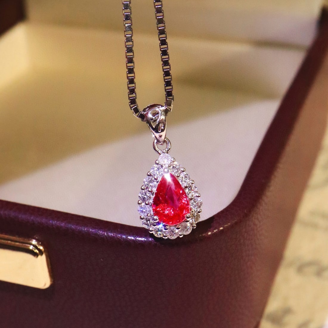 14k Gold 0.92 Ctw Natural Ruby & Diamond Pendant( Without Chain ): Ref:231072448 // gold content:14k gold // main gemstone:ruby // shape:pear // carat weight:0. 72ct // color:red // treatment:natural // // adjacent gemstone 2 : diamond // shape:round // carat