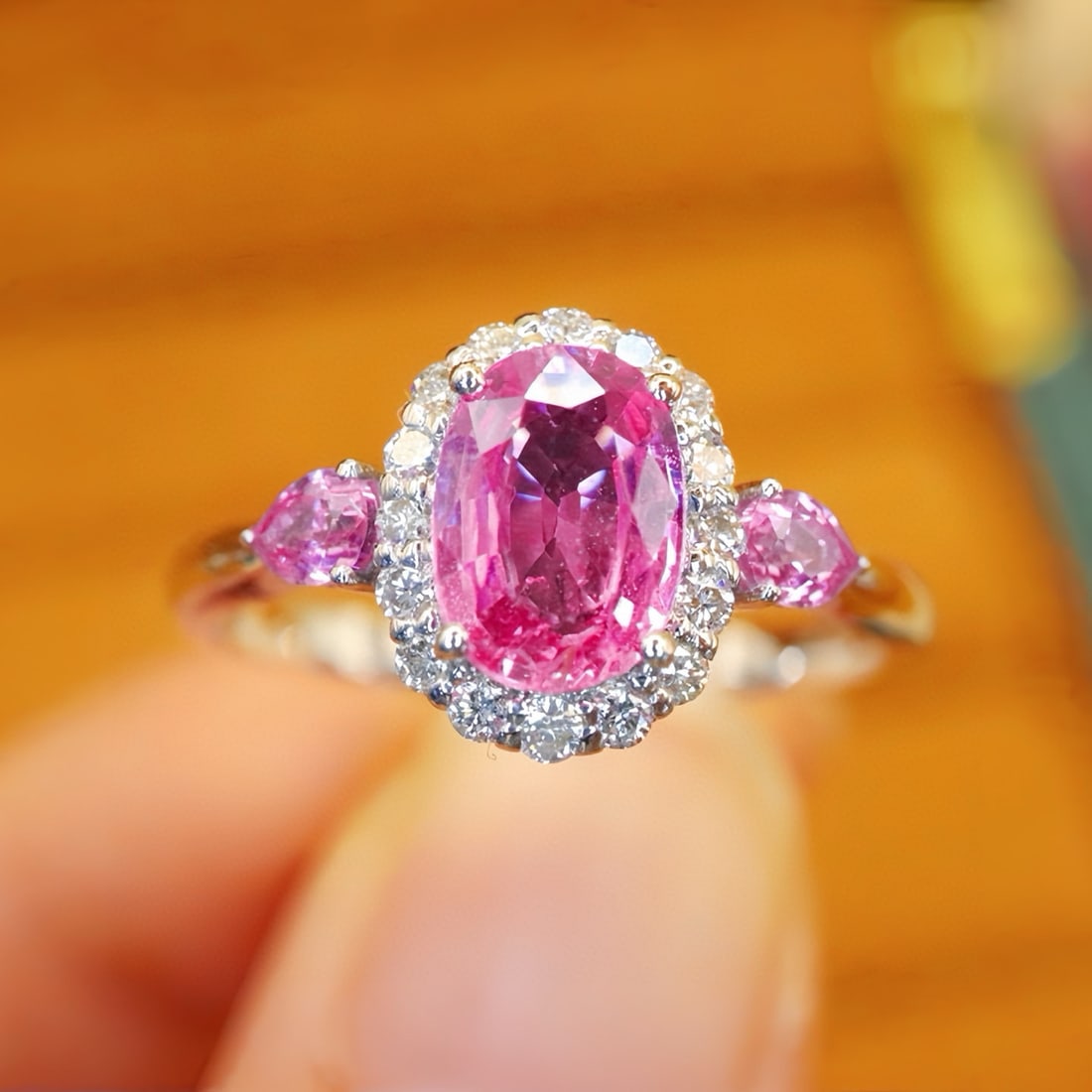 14k Gold 1.19 Ctw Natural Padparadscha Sapphire & Diamond Ring: Ref:231073027 // gold content:14k gold // ring size:7. 25us // // main gemstone:padparadscha sapphire // shape:oval // carat weight:1. 0ct // color:orangish pink // treatment:natural // // adjacent