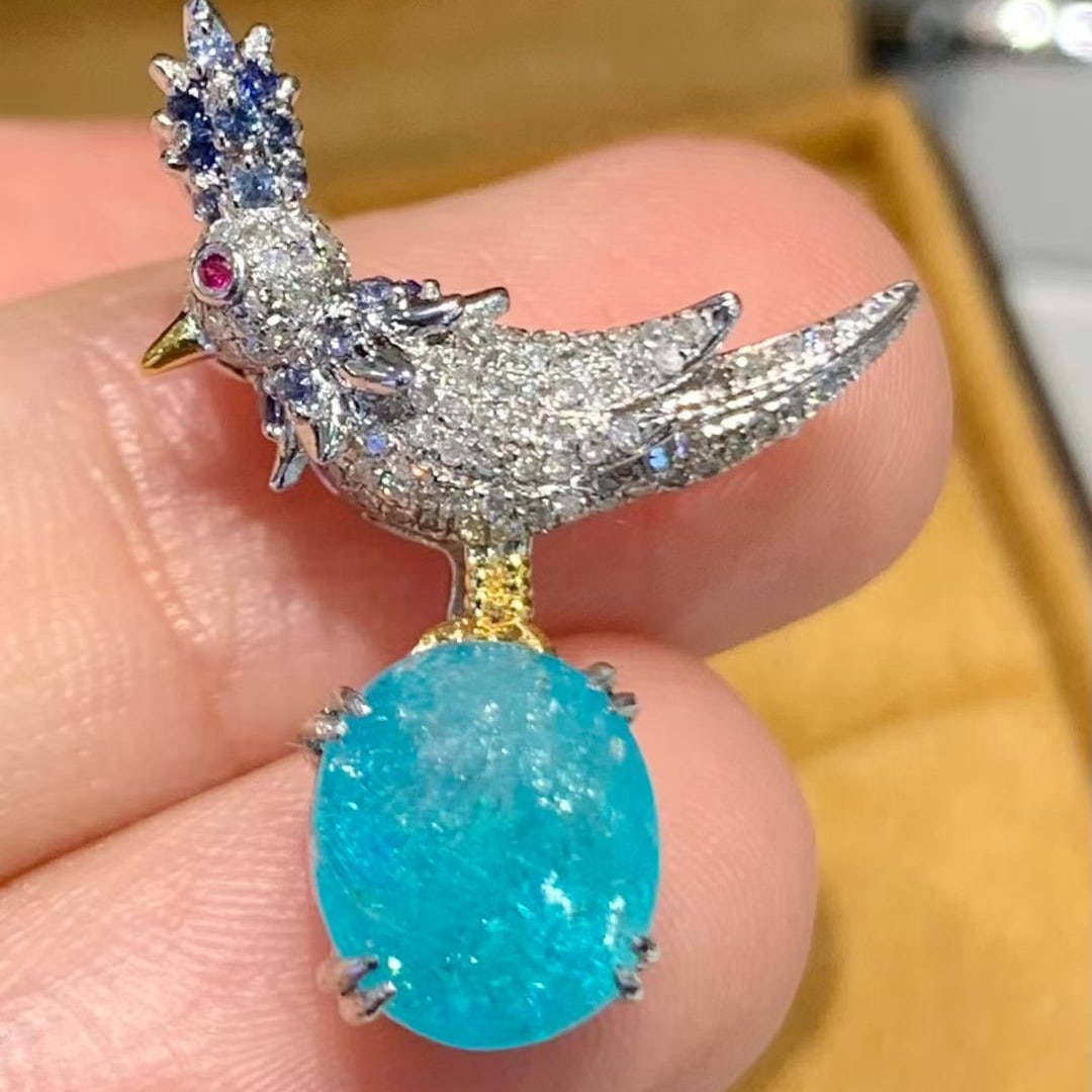 14k Gold 3.2 Ct Natural Paraiba Tourmaline & Diamond Brooch/pendant( Without Chain ): Ref:231073084 // gold content:14k gold // main gemstone:paraiba tourmaline // shape:oval // carat weight:3. 2ct // color:blue // treatment:natural // // adjacent gemstone 2 : diamond // shape:round
