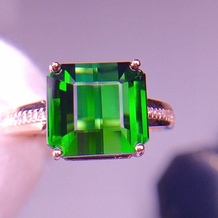 14k Gold 6.01 Ct Natural Tourmaline & Diamond Ring: Ref:231073127 // gold content:14k gold // ring size:7. 25us // // main gemstone:tourmaline // shape:octagonal // carat weight:6. 01ct // color:green // treatment:natural // // adjacent gemstone 2 :