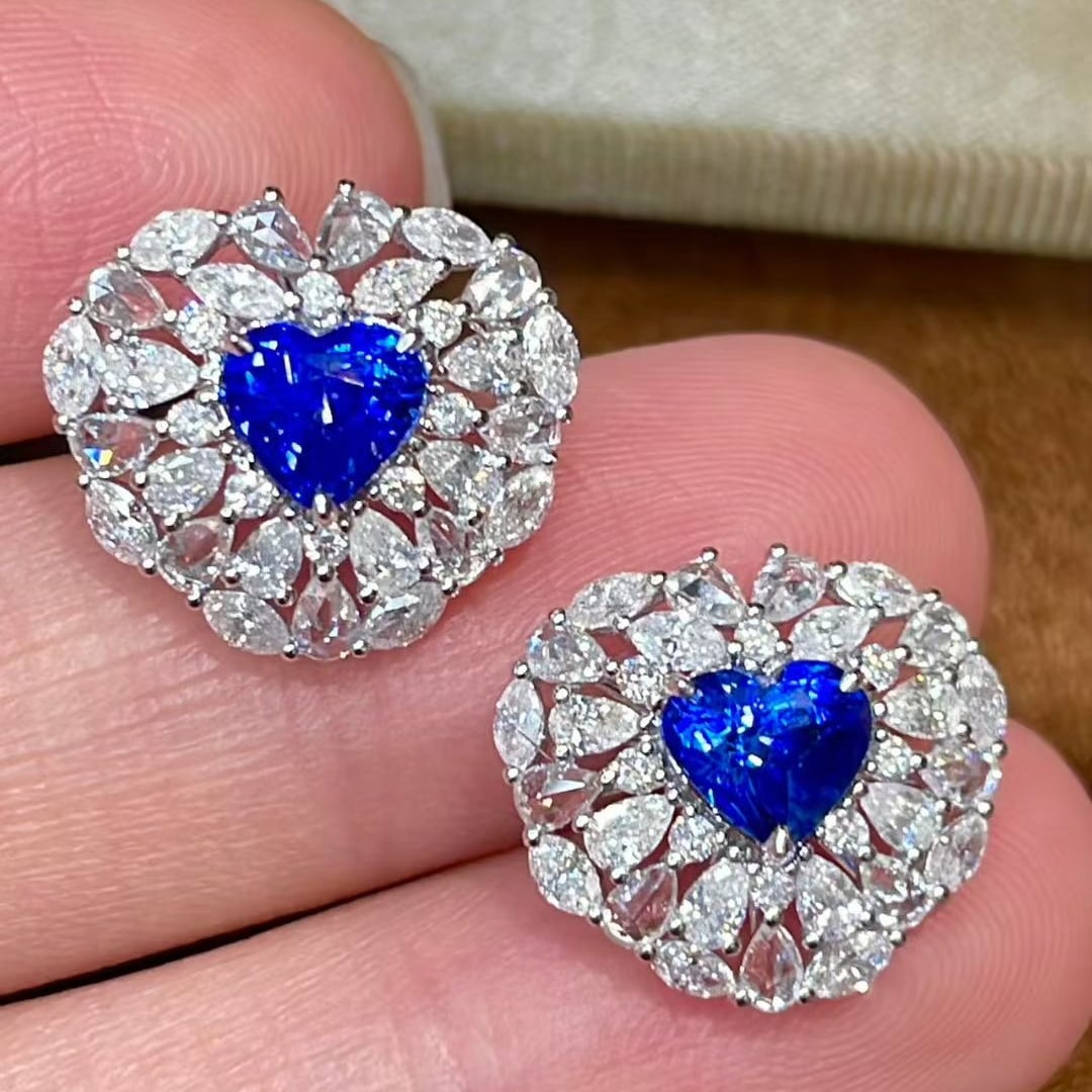 14k Gold 3.7 Ctw Natural Sapphire & Diamond Earrings: Ref:231073221 // gold content:14k gold // main gemstone:sapphire // shape:heart // carat weight:2ct // color:royal blue // treatment:natural // // adjacent gemstone 2 : diamond // shape:multiple //