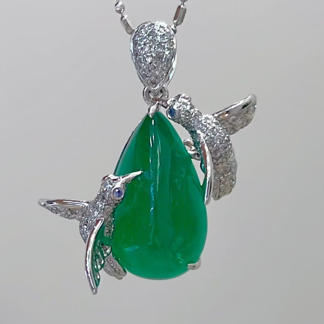 14k Gold 6.3 Ct Natural Emerald & Diamond Pendant( Without Chain ): Ref:231073260 // gold content:14k gold // main gemstone:emerald // shape:pear // carat weight:6. 3ct // color:green // treatment:natural // // adjacent gemstone 2 : diamond // shape:round // clarity
