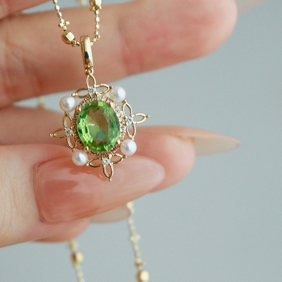 14k Gold 1.7 Ct Natural Tourmaline & Diamond Pendant( Without Chain ): Ref:231074075 // gold content:14k gold // main gemstone:tourmaline // shape:oval // carat weight:1. 7ct // color:green // treatment:natural // // adjacent gemstone 2 : diamond // shape:round //