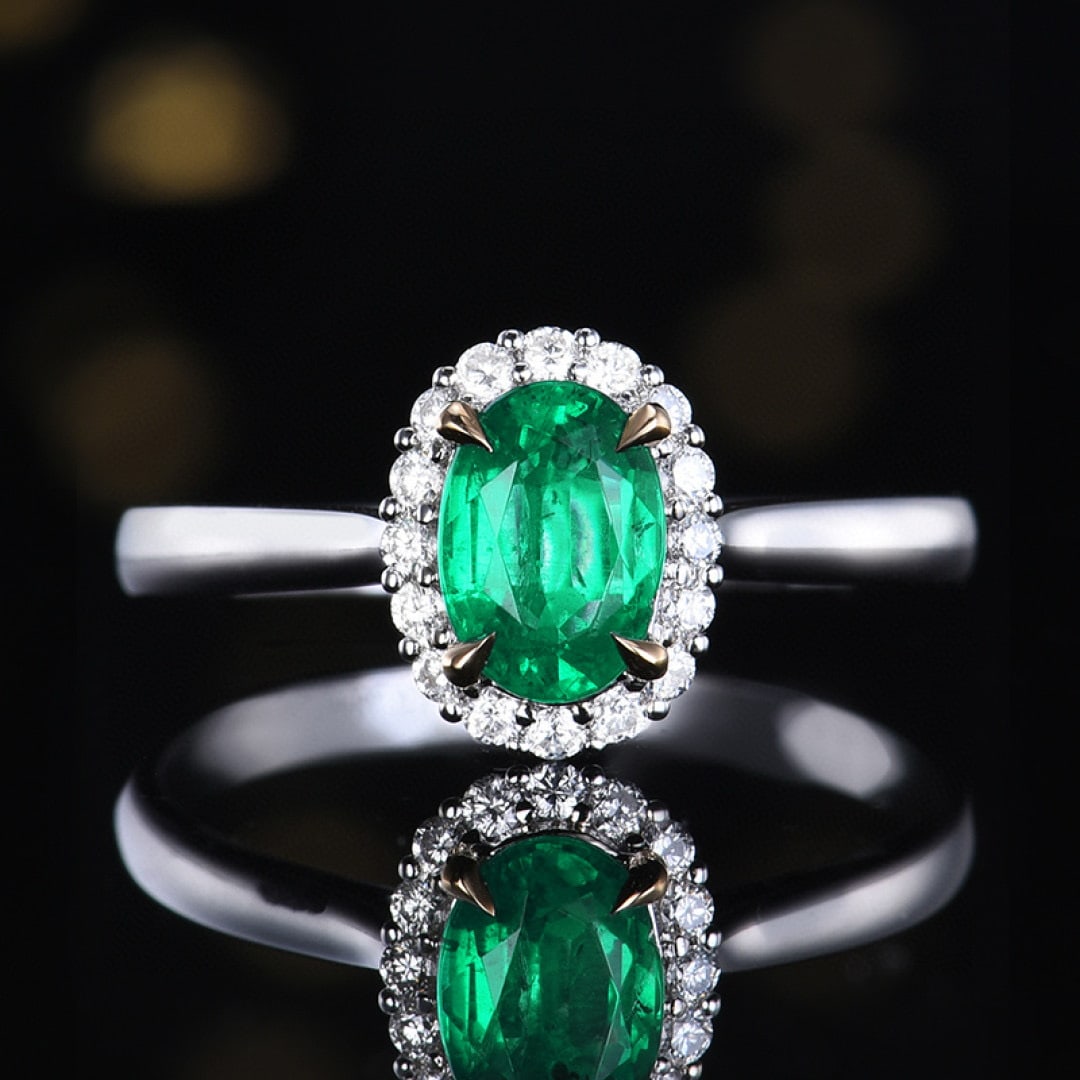 14k Gold 0.92 Ctw Vivid Green Natural Emerald & Diamond Ring: Ref:231074090 // gold content:14k gold // ring size:7. 25us // // main gemstone:emerald // shape:oval // carat weight:0. 76ct // color:vivid green // treatment:natural // // adjacent gemstone 2 :
