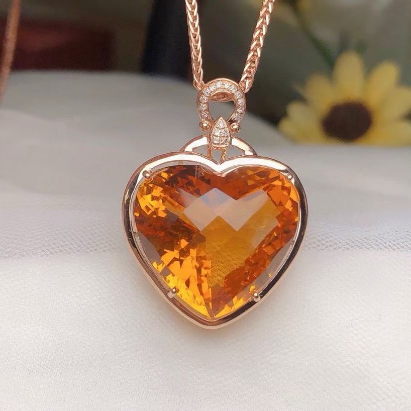 14k Gold 23.02 Ct Natural Citrine & Diamond Pendant( Without Chain ): Ref:231074104 // gold content:14k gold // main gemstone:citrine // shape:heart // carat weight:23. 02ct // color:yellow // treatment:natural // // adjacent gemstone 2 : diamond // number of stones:17