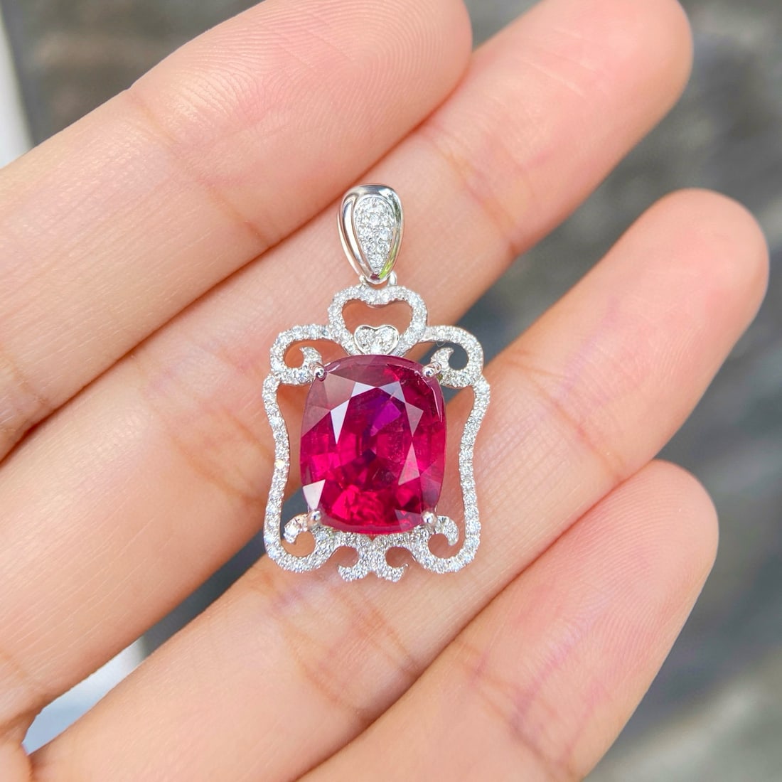 14k Gold 7.29 Ctw Natural Tourmaline & Diamond Pendant( Without Chain ): Ref:231074128 // gold content:14k gold // main gemstone:tourmaline // shape:cushion // carat weight:6. 49ct // color:red // treatment:natural // // adjacent gemstone 2 : diamond // shape:round //