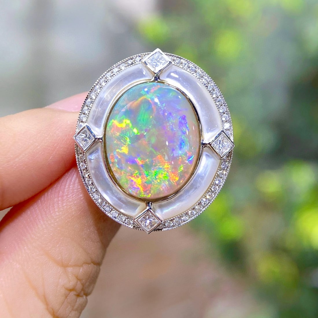 14k Gold 8.10 Ctw Natural Opal & Diamond Ring: Ref:231074144 // gold content:14k gold // ring size:7. 25us // // main gemstone:opal // shape:oval // carat weight:7. 48ct // color:color // treatment:natural // // adjacent gemstone 2 : diamond //