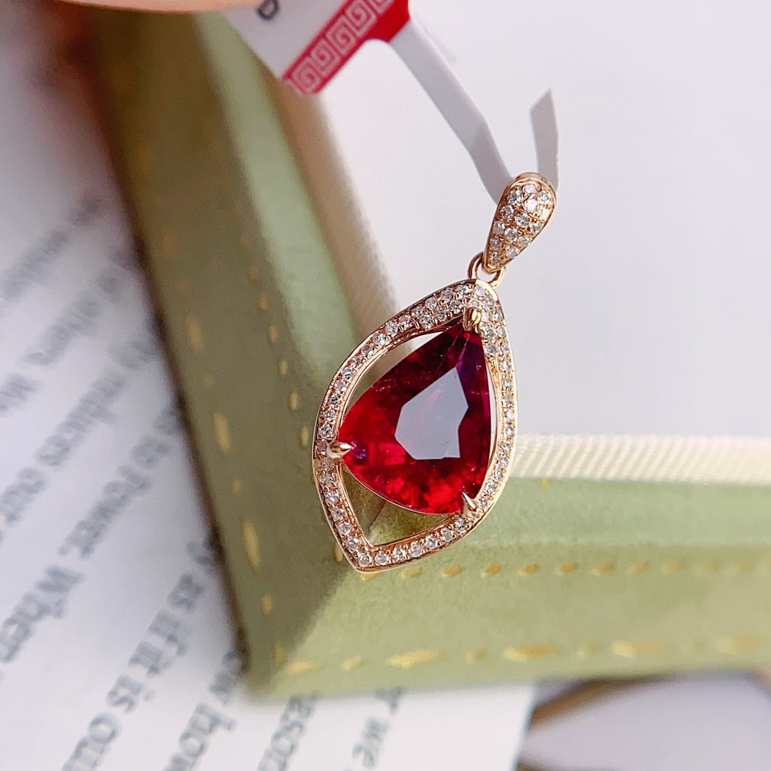 14k Gold 2.15 Ct Natural Tourmaline & Diamond Pendant( Without Chain ): Ref:231074167 // gold content:14k gold // main gemstone:tourmaline // shape:pear // carat weight:2. 15ct // color:red // treatment:natural // // adjacent gemstone 2 : diamond // number of stones:65