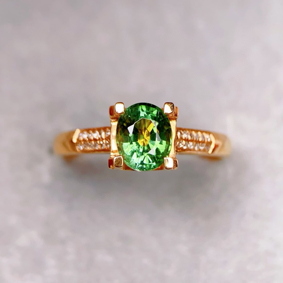 14k Gold 1.1 Ct Natural Tourmaline & Diamond Ring: Ref:231074171 // gold content:14k gold // ring size:7. 25us // // main gemstone:tourmaline // shape:oval // carat weight:1. 1ct // color:green // treatment:natural // // adjacent gemstone 2 : diamond 
