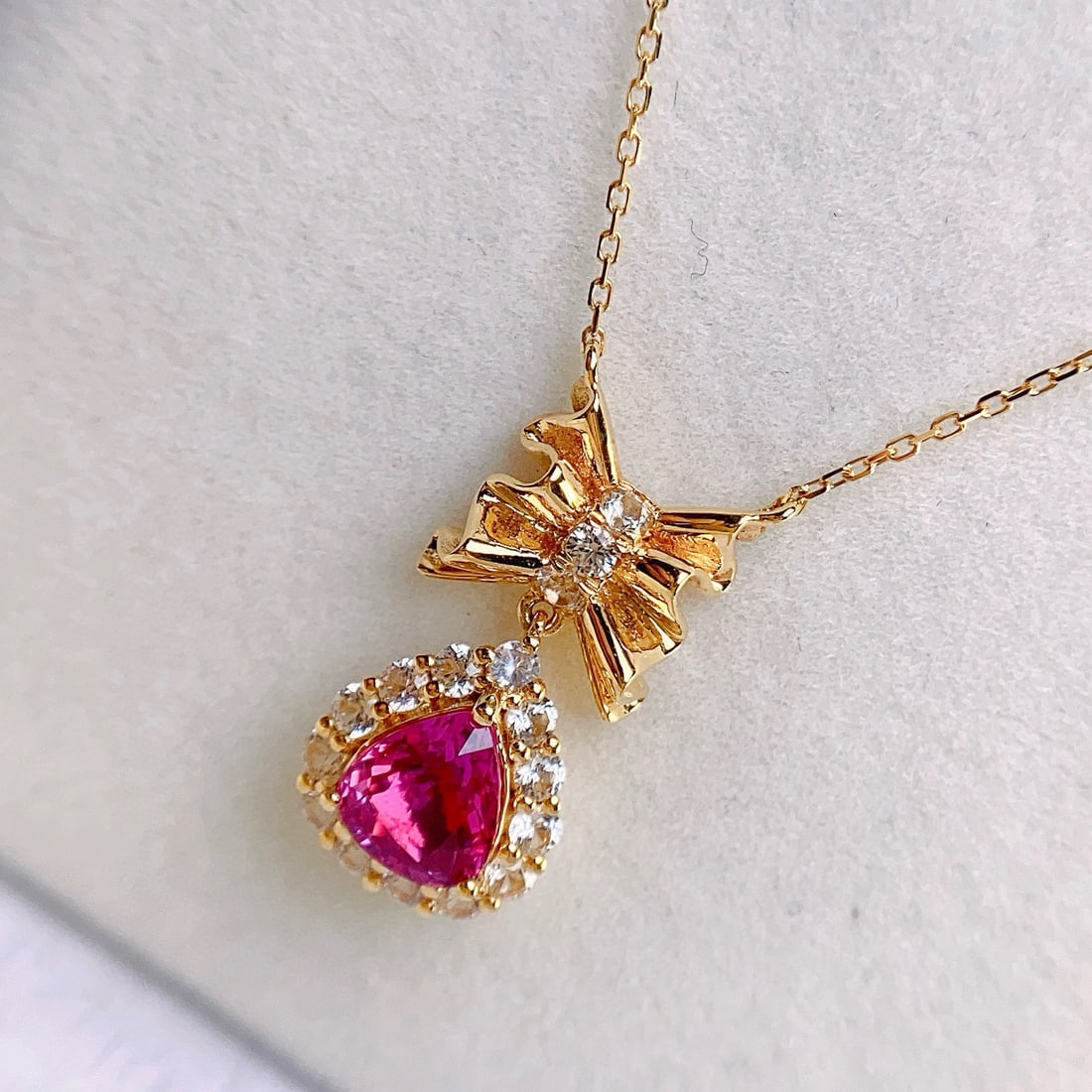 14k Gold 1.10 Ct Natural Ruby & Sapphire Necklace: Ref:231074289 // gold content:14k gold // main gemstone:ruby // shape:pear // carat weight:1. 10ct // color:red // treatment:natural // // adjacent gemstone 2 : sapphire // number of stones:15 //
