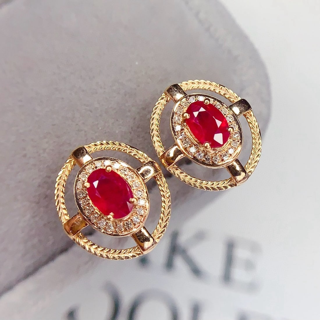 14k Gold 0.8 Ct Natural Ruby & Diamond Earrings: Ref:231074297 // gold content:14k gold // main gemstone:ruby // shape:oval // carat weight:0. 8ct // color:red // treatment:natural // // adjacent gemstone 2 : diamond // number of stones:41 //
