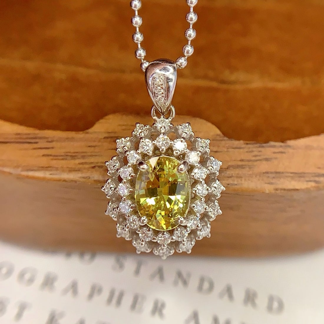 14k Gold 1.16 Ct Natural Sapphire & Diamond Pendant( Without Chain ): Ref:231074309 // gold content:14k gold // main gemstone:sapphire // shape:oval // carat weight:1. 16ct // color:yellow // treatment:natural // // adjacent gemstone 2 : diamond // number of stones:35