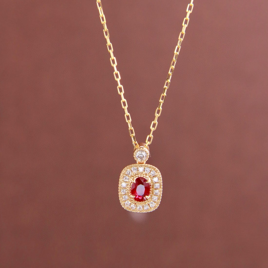 14k Gold 0.21 Ctw Natural Ruby & Diamond Necklace: Ref:231074318 // gold content:14k gold // main gemstone:ruby // shape:oval // carat weight:0. 15ct // color:red // treatment:natural // // adjacent gemstone 2 : diamond // shape:round // carat weight: