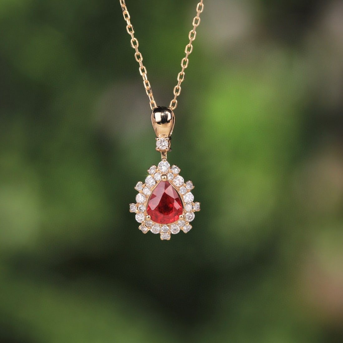 14k Gold 0.53 Ct Natural Ruby & Diamond Necklace: Ref:231074336 // gold content:14k gold // main gemstone:ruby // shape:pear // carat weight:0. 53ct // color:red // treatment:natural // // adjacent gemstone 2 : diamond // shape:round // clarity