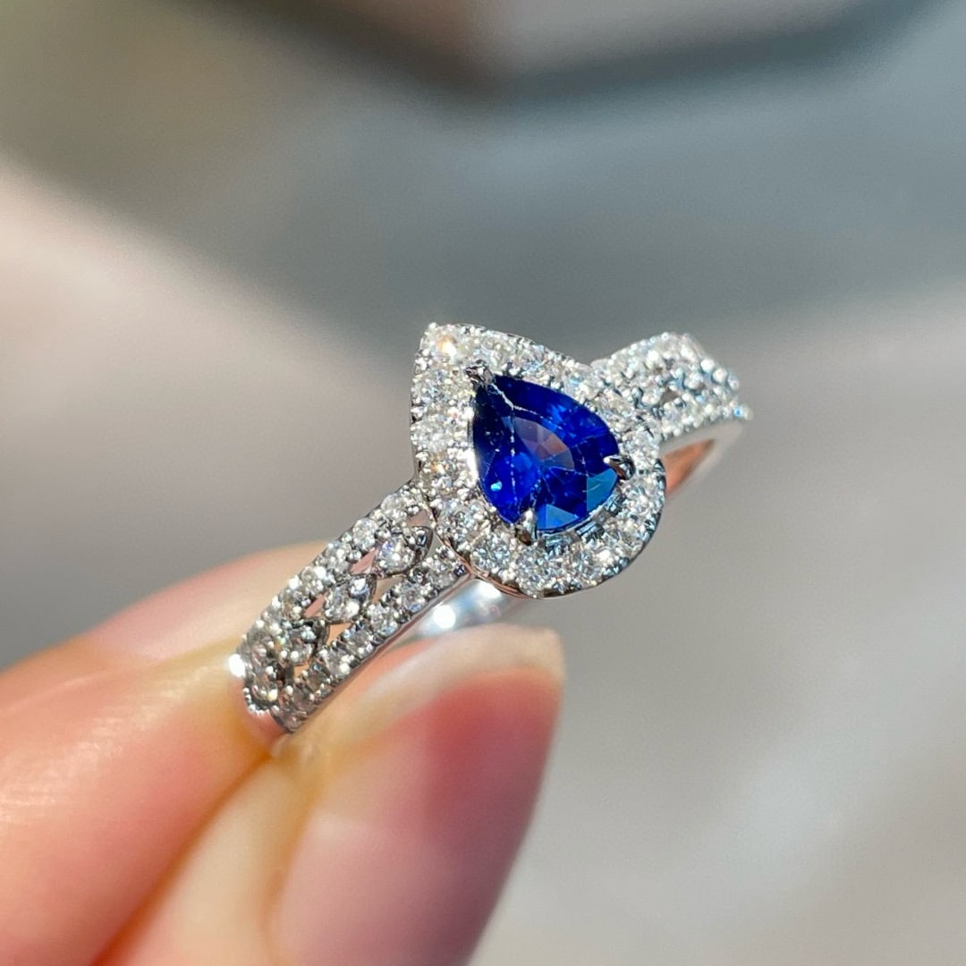 14k Gold 0.5 Ct Natural Sapphire & Diamond Ring: Ref:231074343 // gold content:14k gold // ring size:7. 25us // // main gemstone:sapphire // shape:pear // carat weight:0. 5ct // color:royal blue // treatment:natural // // adjacent gemstone 2 :