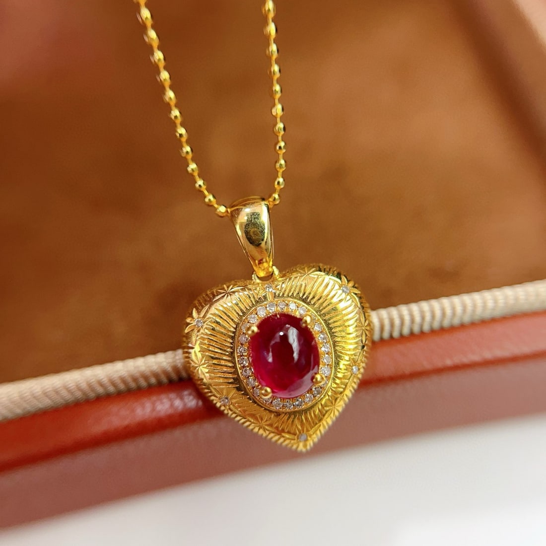 14k Gold 1.35 Ct Natural Ruby & Diamond Pendant( Without Chain ): Ref:231074359 // gold content:14k gold // main gemstone:ruby // shape:oval // carat weight:1. 35ct // color:red // treatment:natural // // adjacent gemstone 2 : diamond // number of stones:32 //