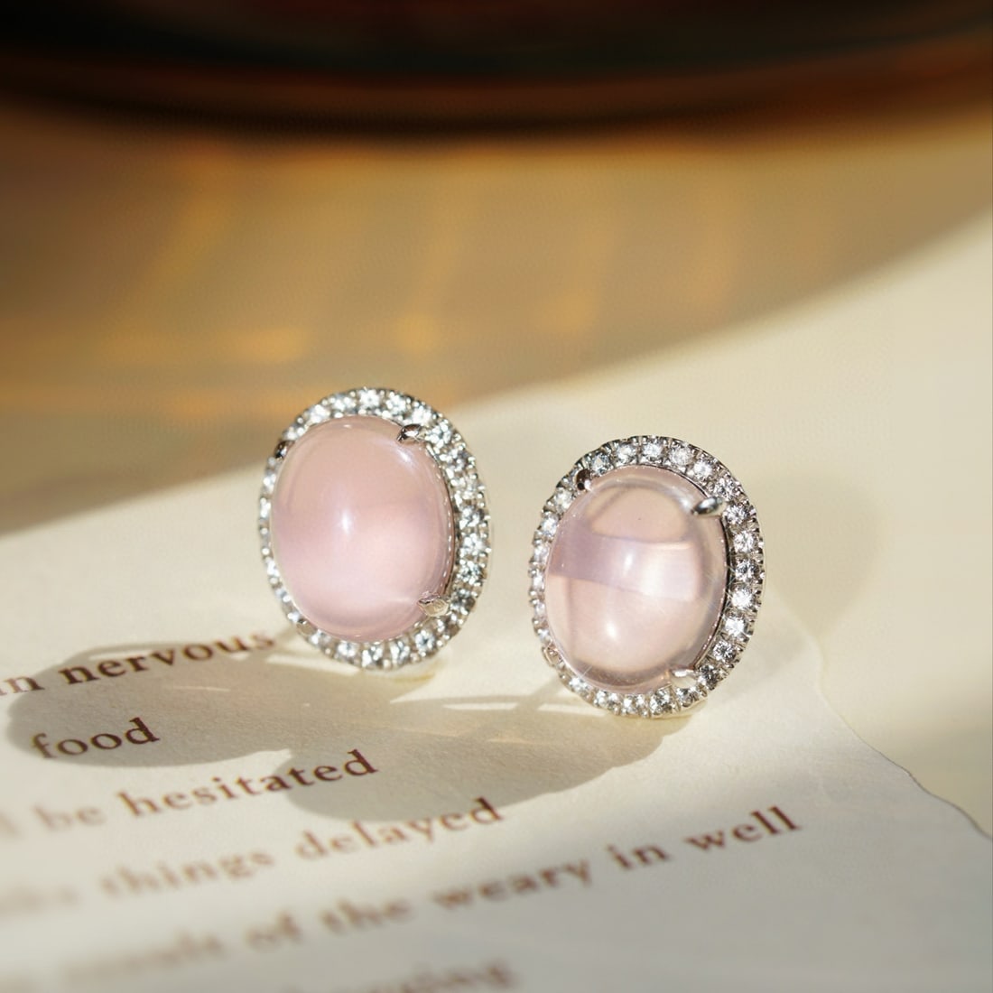 14k Gold 5.36 Ctw Natural Rose Quartz & Sapphire Earrings: Ref:231074412 // gold content:14k gold // main gemstone:rose quartz // shape:oval // carat weight:5. 00ct // color:pink // treatment:natural // // adjacent gemstone 2 : sapphire // shape:round //