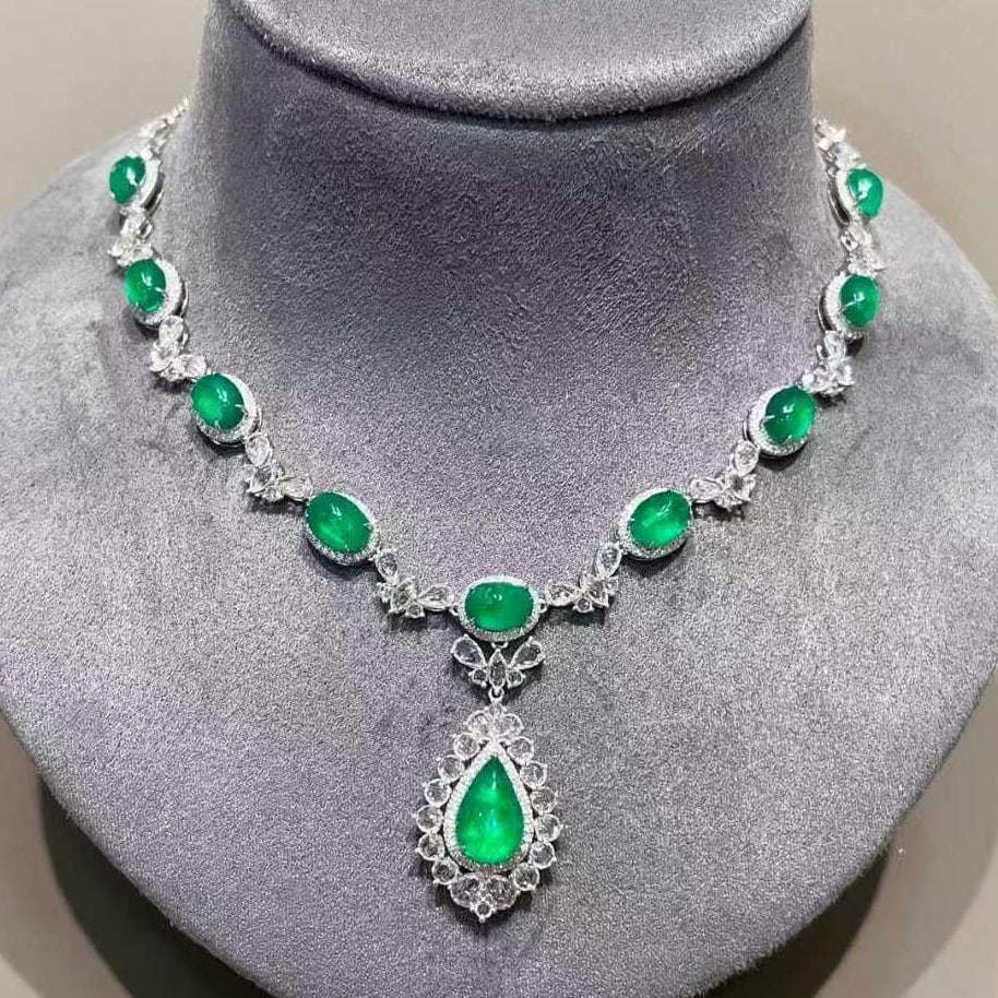 14k Gold 9.5 Ct Vivid Green Natural Emerald & Diamond & Sapphire Necklace: Ref:231075004 // gold content:14k gold // main gemstone:emerald // shape:multiple // carat weight:9. 5ct // color:vivid green // treatment:natural // // adjacent gemstone 2 : diamond // shape:round
