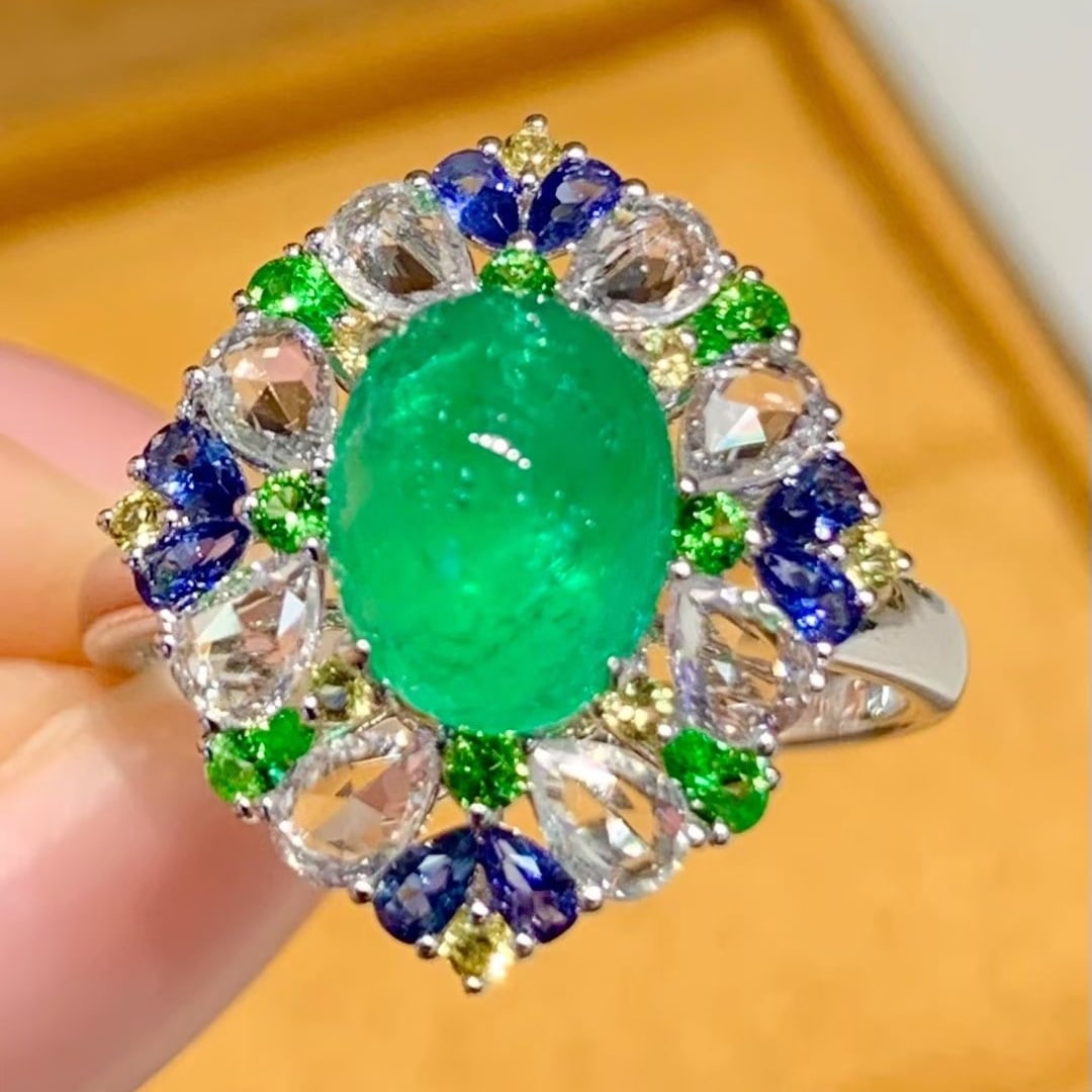 14k Gold 1.8 Ct Natural Emerald & Sapphire & Tsavorite Ring: Ref:231075104 // gold content:14k gold // ring size:7. 25us // // main gemstone:emerald // shape:oval // carat weight:1. 8ct // color:green // treatment:natural // // adjacent gemstone 2 : sapphire