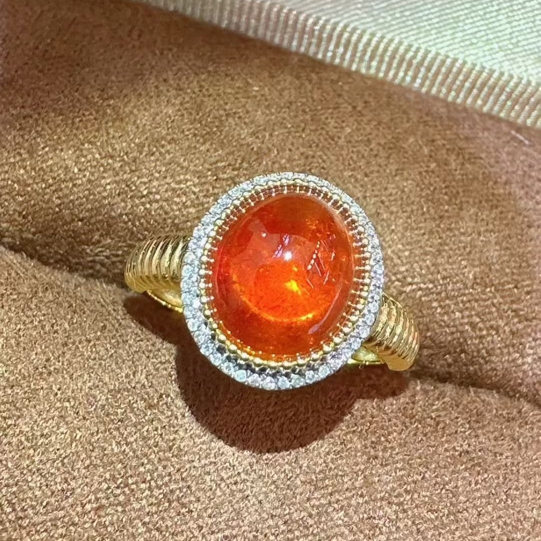 14k Gold 4.7 Ct Natural Spessartine & Diamond Ring: Ref:231075204 // gold content:14k gold // ring size:7. 25us // // main gemstone:spessartine // shape:oval // carat weight:4. 7ct // color:orange // treatment:natural // // adjacent gemstone 2 :
