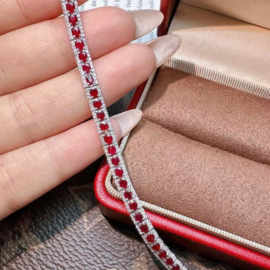 14k Gold 4.2 Ct Natural Ruby & Diamond Bracelet: Ref:231075221 // gold content:14k gold // main gemstone:ruby // shape:oval // carat weight:4. 2ct // color:pigeonblood red // treatment:natural // // adjacent gemstone 2 : diamond // shape:round //