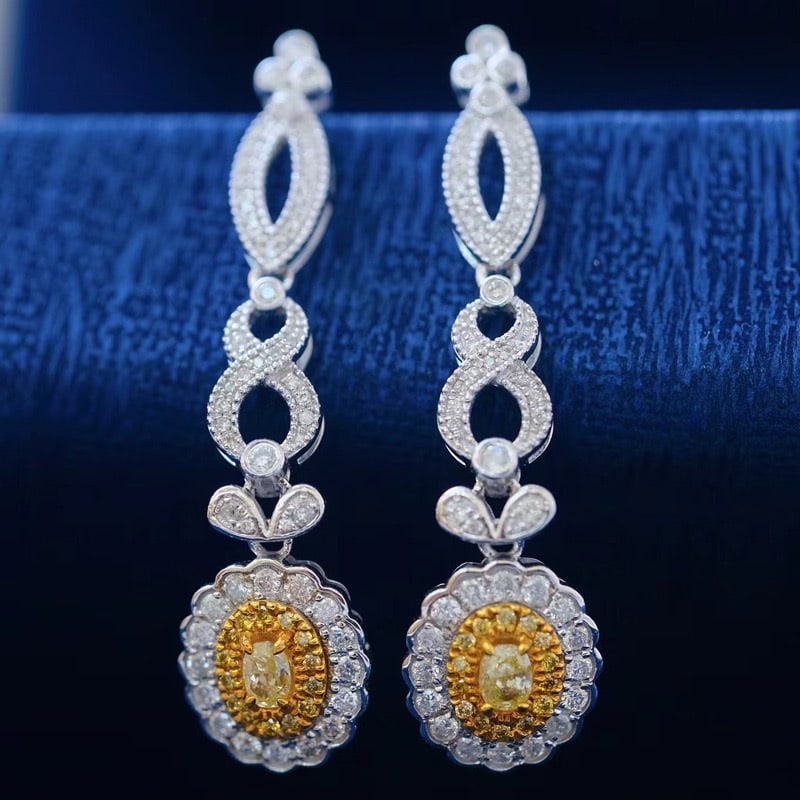 14k Gold 1.38 Ct Natural Color Diamond Earrings: Ref:231076052 // gold content:14k gold // main gemstone:diamond // shape:multiple // carat weight:1. 38ct // clarity grade:vs-si // color:color // treatment:natural // Condition: New Low Estimate: