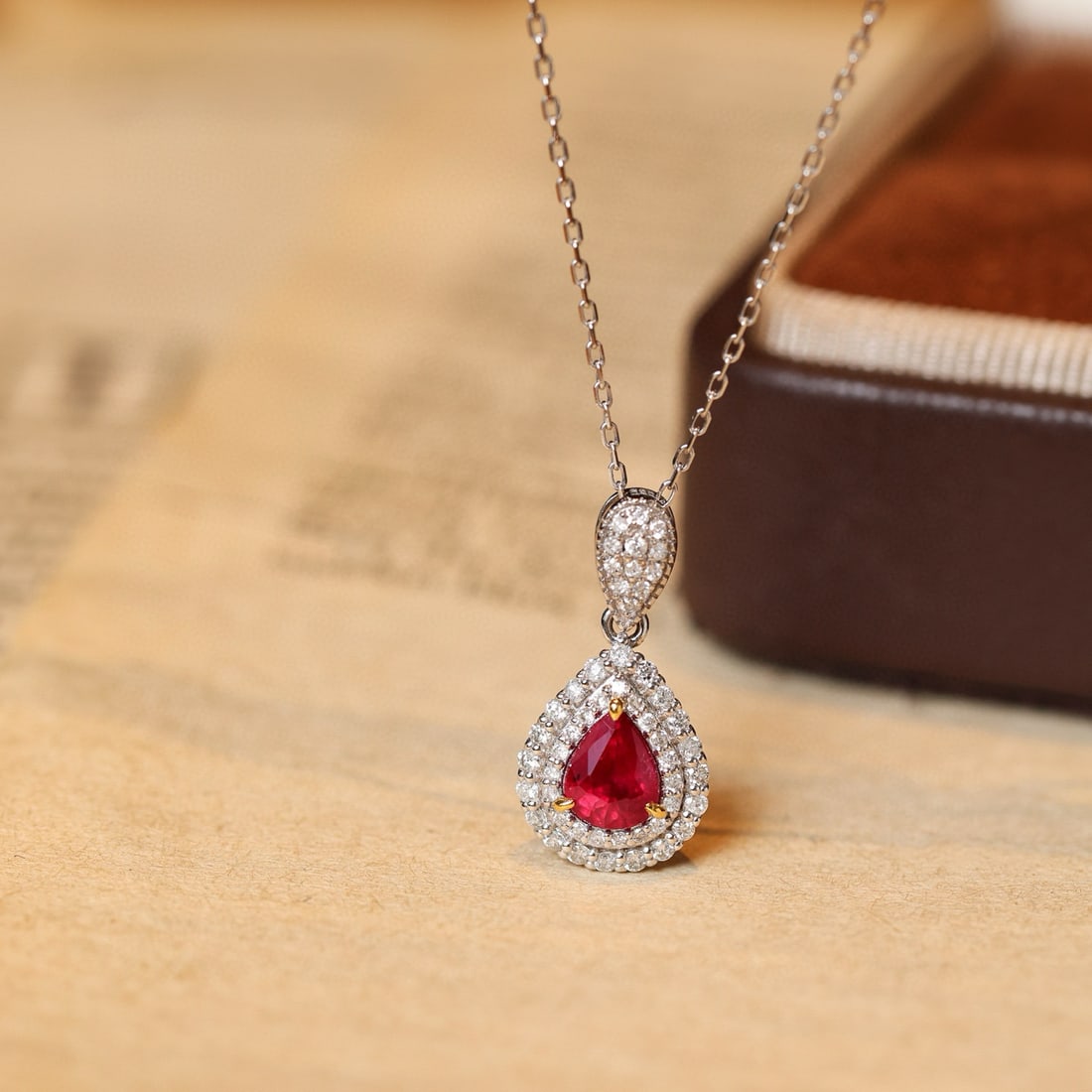 14k Gold 0.96 Ctw Natural Ruby & Diamond Pendant( Without Chain ): Ref:231076431 // gold content:14k gold // main gemstone:ruby // shape:pear // carat weight:0. 65ct // color:red // treatment:natural // // adjacent gemstone 2 : diamond // shape:round // carat