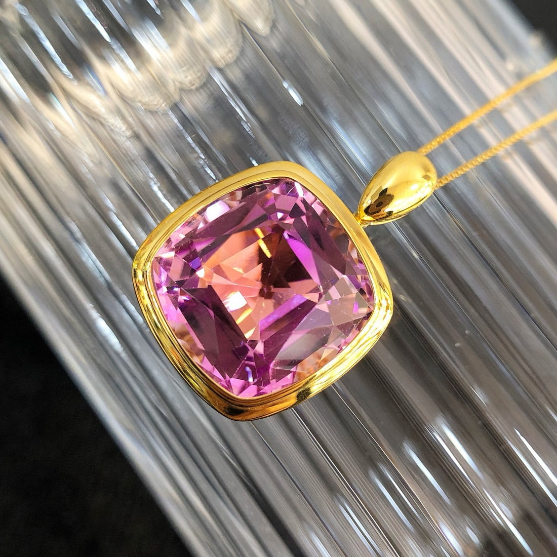 14k Gold 16.96 Ct Natural Kunzite Pendant( Without Chain ): Ref:231083018 // gold content:14k gold // main gemstone:kunzite // shape:cushion // carat weight:16. 96ct // color:purple // treatment:natural // Condition: New Low Estimate: 5100.00 High Estimate: