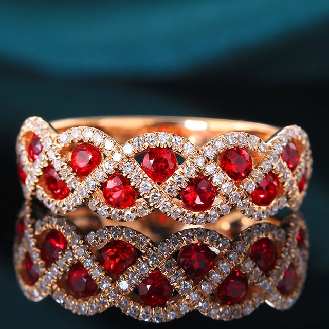 14k Gold 1.04 Ctw Natural Ruby & Diamond Ring: Ref:231083025 // gold content:14k gold // ring size:7. 25 us // // main gemstone:ruby // shape:round // carat weight:0. 7ct // color:red // treatment:natural // cut grade:g // // adjacent gemstone 2