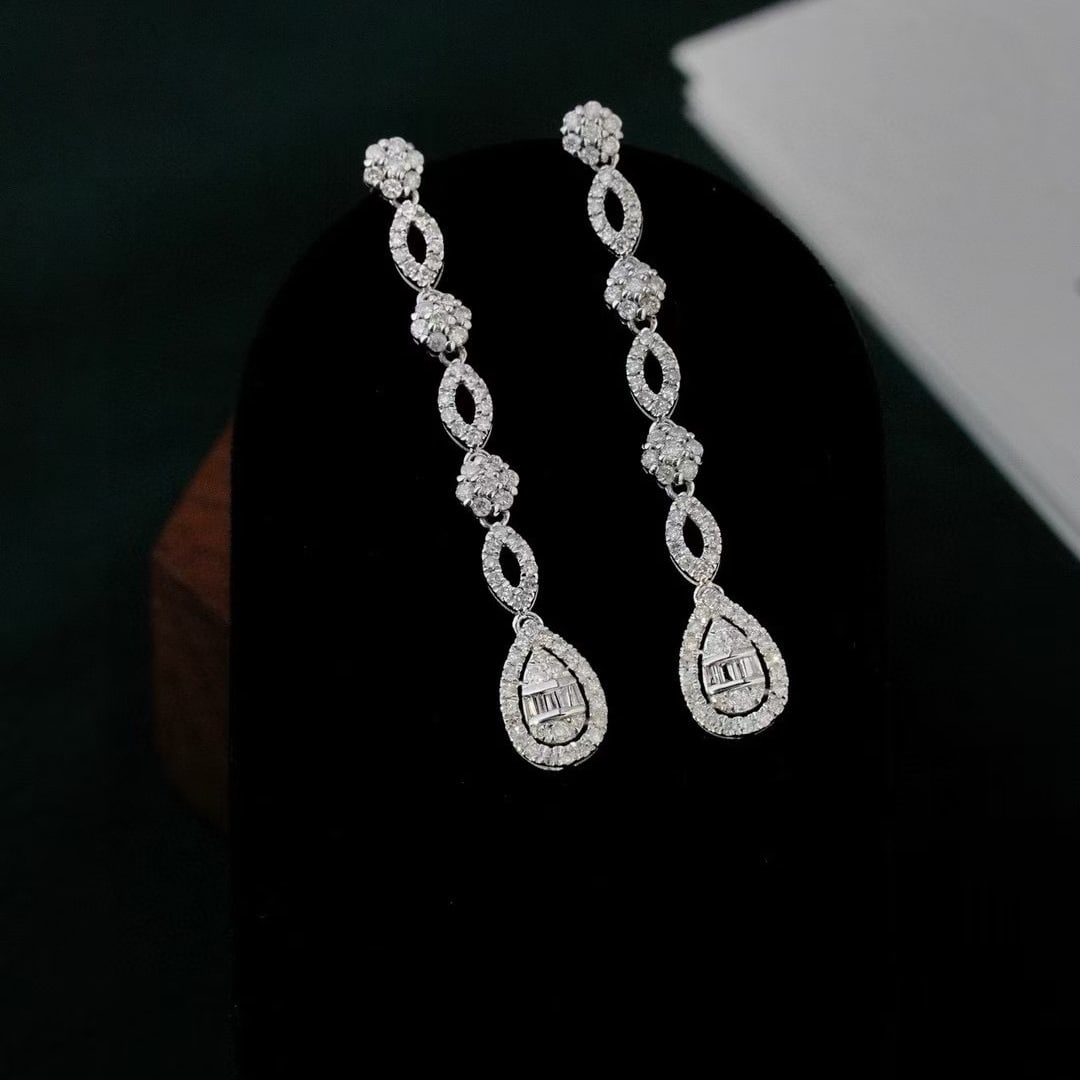 14k Gold 1.0 Ct Natural H Diamond Earrings: Ref:231083034 // gold content:14k gold // main gemstone:diamond // shape:multiple // carat weight:1. 0ct // clarity grade:vs-si // color:h // treatment:natural // Condition: New Low Estimate: 3100.00