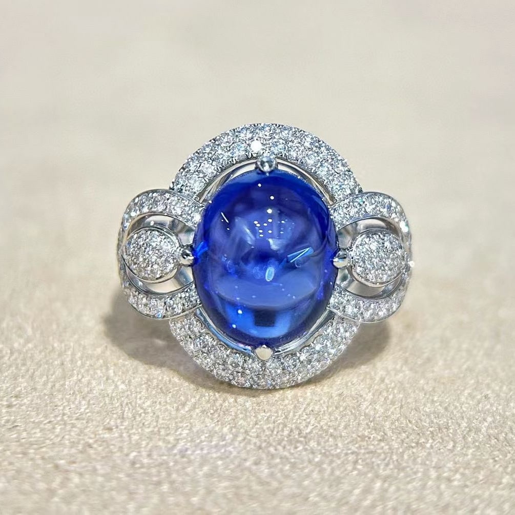 14k Gold 8.22 Ctw Natural Tanzanite & Diamond Ring: Ref:231083047 // gold content:14k gold // ring size:7. 25 us // // main gemstone:tanzanite // shape:oval // carat weight:7. 43ct // color:blue // treatment:natural // // adjacent gemstone 2 : diamond