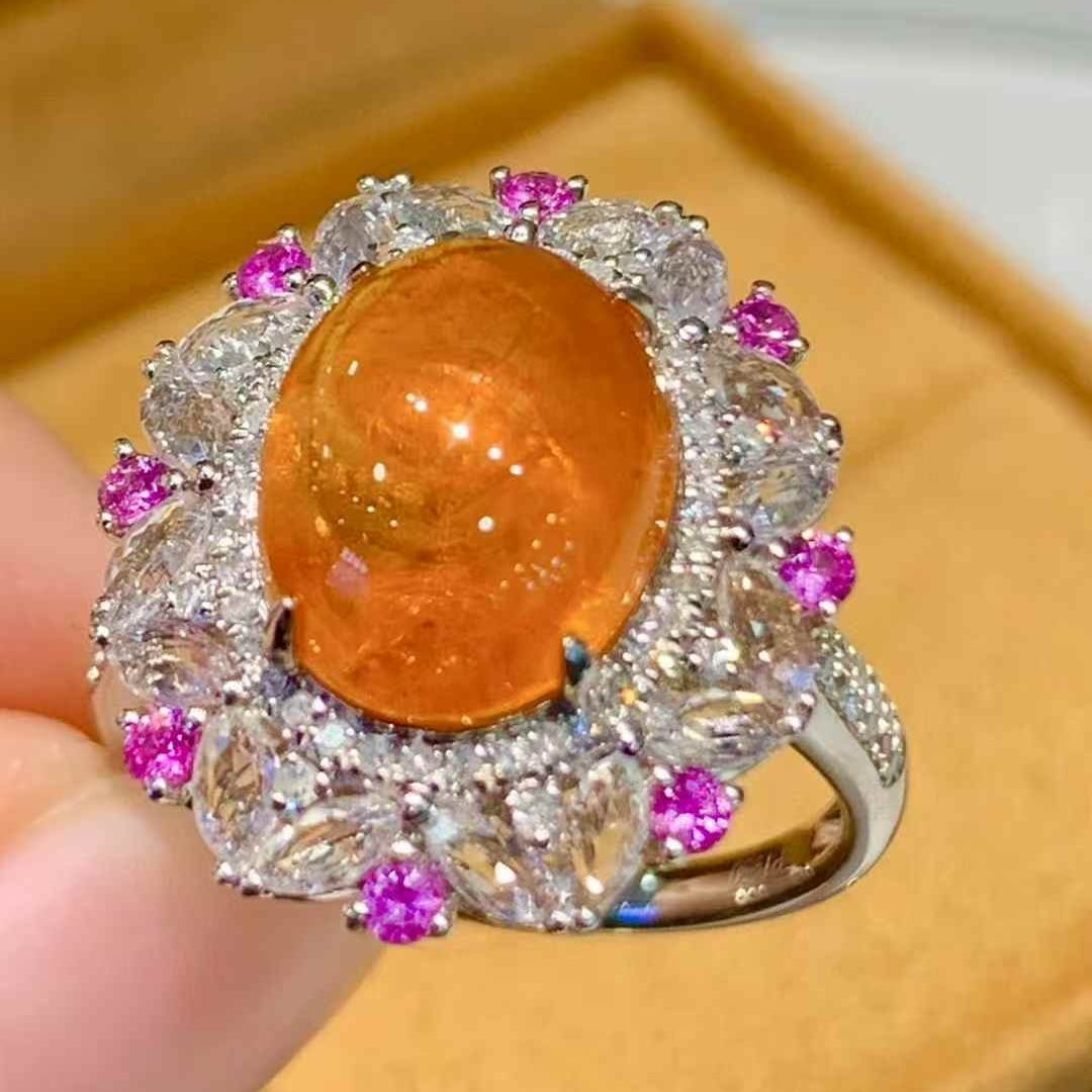 14k Gold 6.35 Ct Natural Spessartine & Diamond & Coloured Gemstone Ring: Ref:231083086 // gold content:14k gold // ring size:7. 25 us // // main gemstone:spessartine // shape:oval // carat weight:6. 35ct // color:orange // treatment:natural // // adjacent gemstone 2 :
