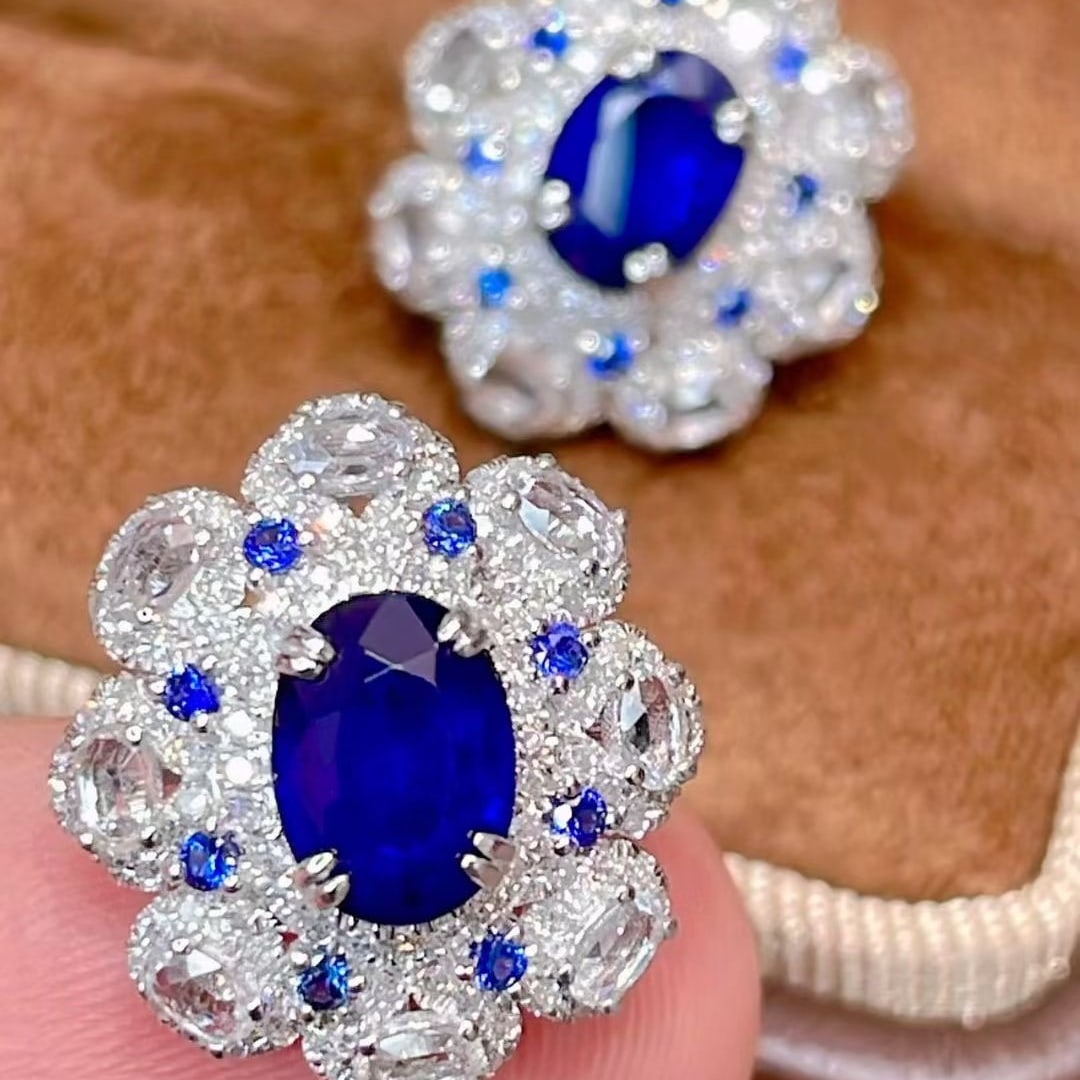 14k Gold 2.3 Ct Natural Sapphire & Diamond & Sapphire Earrings: Ref:231083097 // gold content:14k gold // main gemstone:sapphire // shape:oval // carat weight:2. 3ct // color:blue // treatment:natural // // adjacent gemstone 2 : diamond // shape:round // clarity