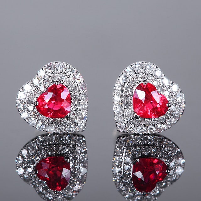 14k Gold 1.23 Ctw Natural Ruby & Diamond Earrings: Ref:231083104 // gold content:14k gold // main gemstone:ruby // shape:heart // carat weight:0. 92ct // color:red // treatment:natural // // adjacent gemstone 2 : diamond // number of stones:76 //