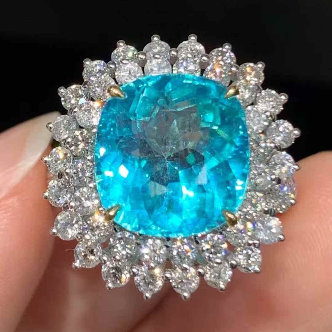 14k Gold 6.3 Ct Natural Paraiba Tourmaline & Diamond Ring: Ref:231083109 // gold content:14k gold // ring size:7. 25us // // main gemstone:paraiba tourmaline // shape:cushion // carat weight:6. 3ct // color:blue // treatment:natural // // adjacent gemstone 2