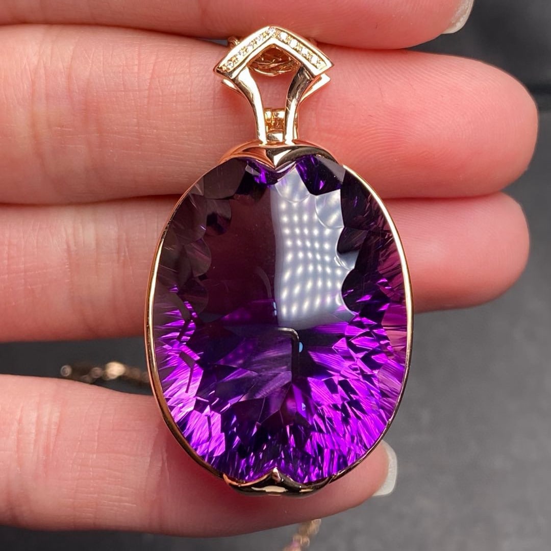 14k Gold 57.5 Ct Natural Amethyst & Diamond Pendant( Without Chain ): Ref:231083135 // gold content:14k gold // main gemstone:amethyst // shape:oval // carat weight:57. 5ct // color:purple // treatment:natural // // adjacent gemstone 2 : diamond // number of stones:9