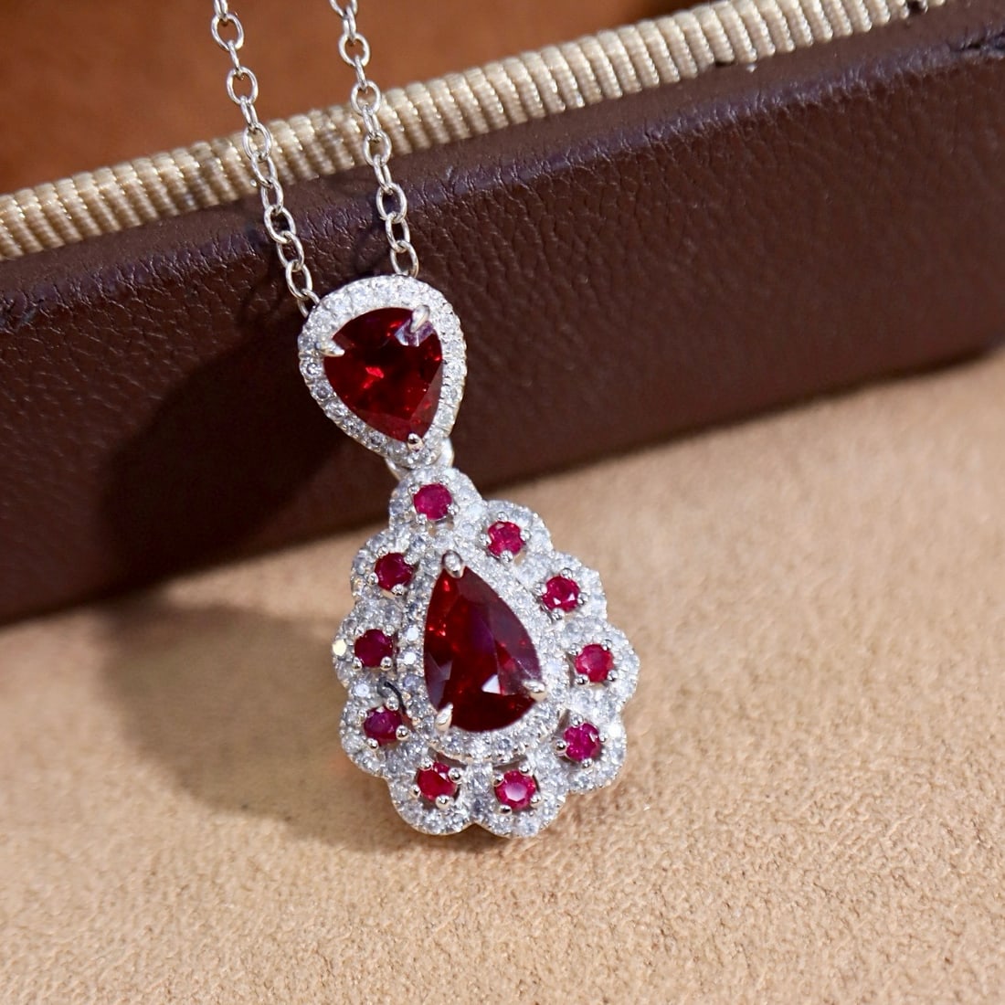 14k Gold 1.71 Ctw Natural Ruby & Diamond Pendant( Without Chain ): Ref:231083143 // gold content:14k gold // main gemstone:ruby // shape:pear // carat weight:1. 46ct // color:red // treatment:natural // // adjacent gemstone 2 : diamond // shape:round // carat